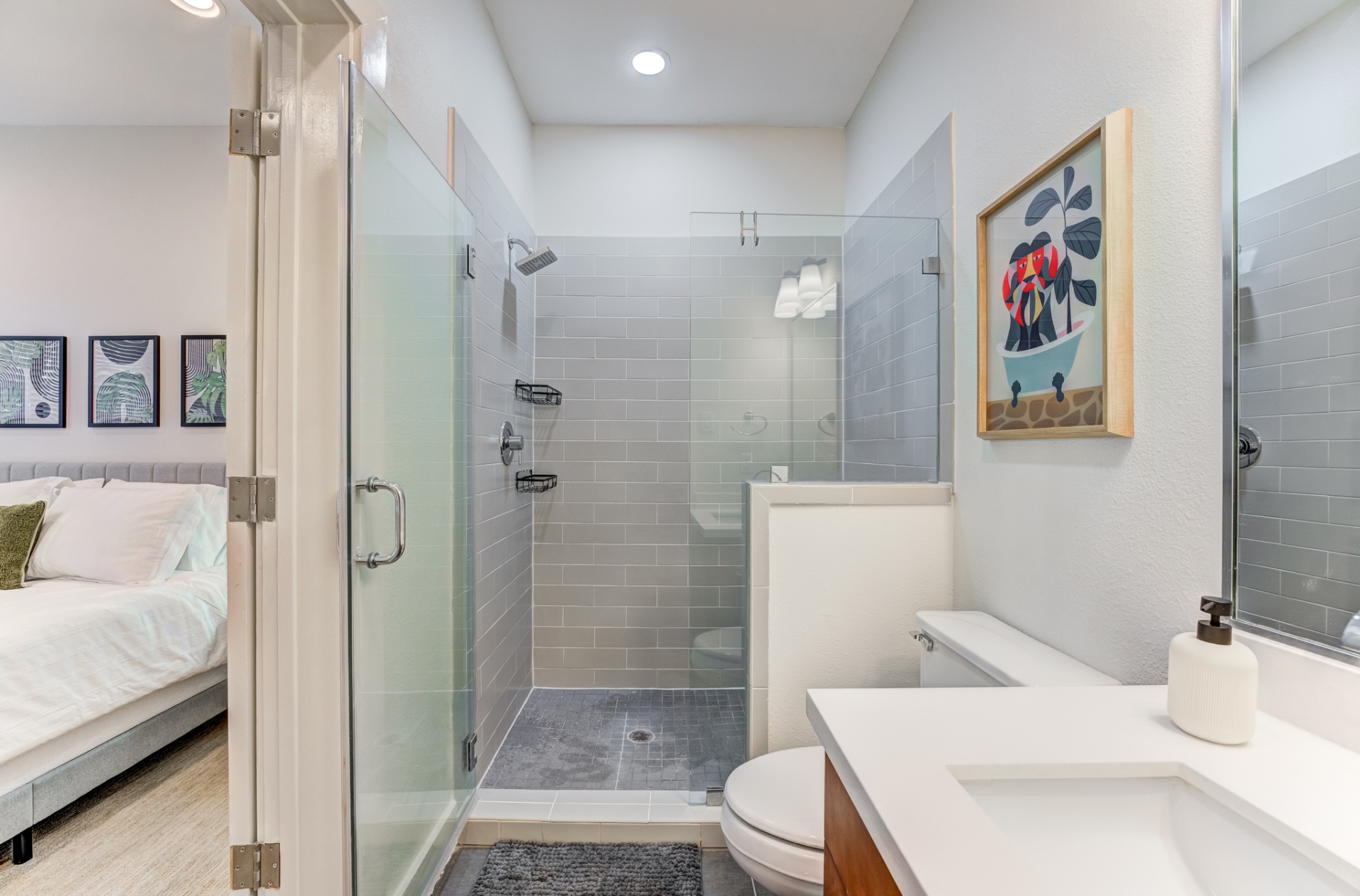 First-floor bedroom ensuite bathroom with walk-in tile shower