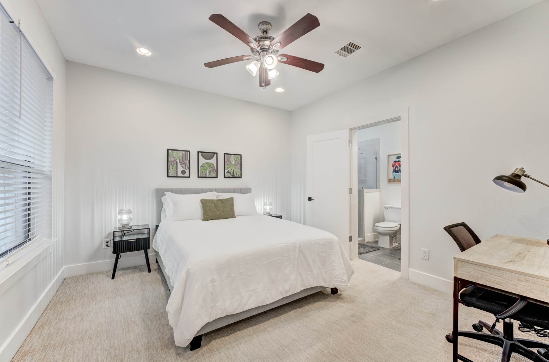 First-floor bedroom with queen bed and ensuite bath